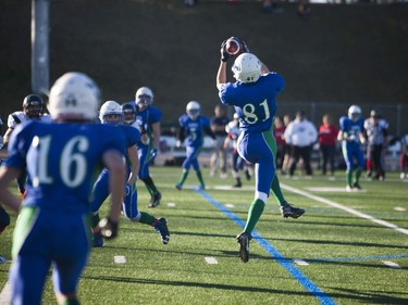 Bishop J. Mahoney Saints #81 Alex Regehr catches the ball during play against the Regina Miller Marauders during the 3A Regional Playoffs at SMF Field in Saskatoon, November 5, 2016.