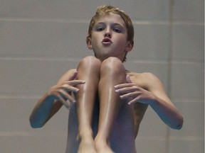 Rylan Wiens competes at the Junior development national diving championship at the Shaw Centre in Saskatoon on August 4, 2013.