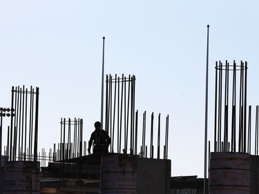A worker is seen surrounded by a rebar jungle in supports for a new hotel project on the University of Saskatchewan campus at College Drive and Stadium Crescent, November 7, 2016.