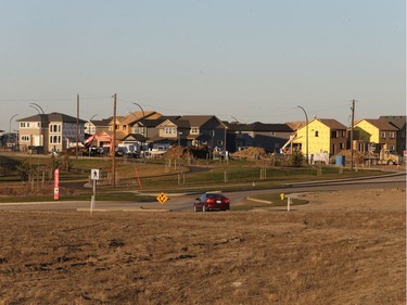 Work continues on houses in the Brighton neighbourhood of Saskatoon as a park for families is already good to play in, November 7, 2016.