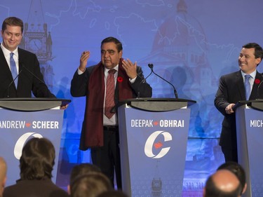 L-R: Candidates Andrew Scheer, Deepak Obhrai and Michael Chong participate in the Conservative Party's first leadership debate in Saskatoon, moderated by Kaveri Braid, November 9, 2016.