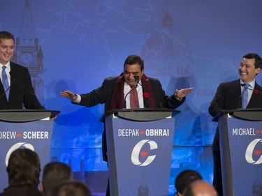 L-R: Candidates Andrew Scheer, Deepak Obhrai and Michael Chong participate in the Conservative Party's first leadership debate in Saskatoon, moderated by Kaveri Braid, November 9, 2016.