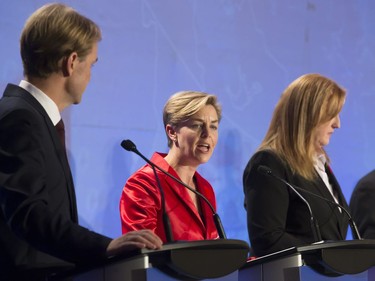 L-R: Candidates Chris Alexander, Kellie Leitch and Lisa Raitt participate in the Conservative Party's first leadership debate in Saskatoon, moderated by Kaveri Braid, November 9, 2016.
