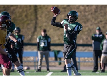 Holy Cross Crusaders quarterback Jonah Humphrey throws a pass against the LeBoldus Golden Suns during the High school football 4A provincial final at SMS field in Saskatoon, SK. on Saturday, November 12, 2016. (LIAM RICHARDS/THE STAR PHOENIX)