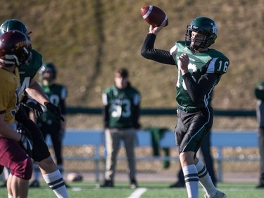 Holy Cross Crusaders quarterback Jonah Humphrey throws a pass against the LeBoldus Golden Suns during the high school football 4A provincial final at SMS field in Saskatoon, November 12, 2016.