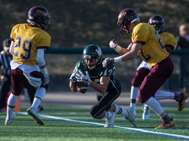 Holy Cross Crusaders receiver Steven Gilewiez drops a pass in the end zone against the LeBoldus Golden Suns during the high school football 4A provincial final at SMS field in Saskatoon, November 12, 2016.