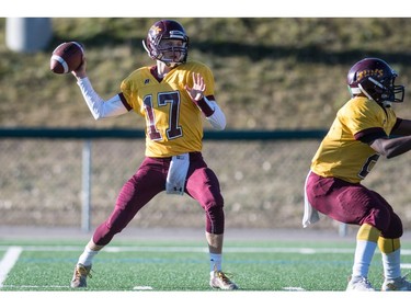 LeBoldus Golden Suns quarterback Josh Donnelly throws a pass against the Holy Cross Crusaders during the High school football 4A provincial final at SMS field in Saskatoon, SK. on Saturday, November 12, 2016. (LIAM RICHARDS/THE STAR PHOENIX)