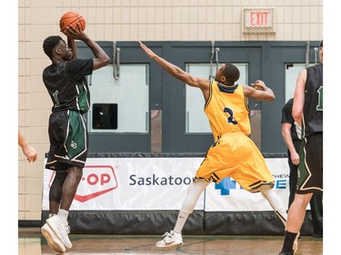 University of Saskatchewan Huskies guard Chan De Ciman takes a shot against the University of Brandon Bobcats in CIS Men's Basketball action at the PAC in Saskatoon, November 19, 2016.