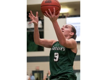 University of Saskatchewan Huskies forward Megan Lindquist attempts a take a shot against the University of Brandon Bobcats in CIS Women's Basketball action at the PAC in Saskatoon, November 19, 2016.