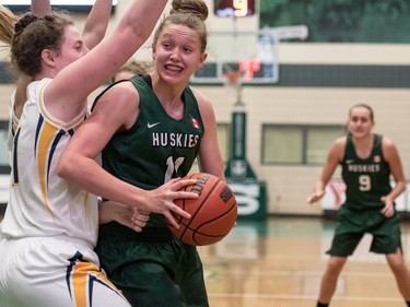 University of Saskatchewan Huskies forward #11 Summer Masikewich attempts to take a shot against the University of Brandon Bobcats in CIS Women's Basketball action at the PAC in Saskatoon, November 19, 2016.