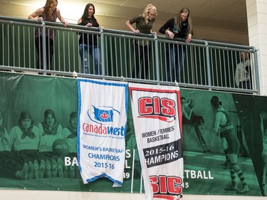 University of Saskatchewan Huskies women's basketball team alumni unveil their championship banners from last year's win following a game against the University of Brandon Bobcats in CIS Women's Basketball action at the PAC in Saskatoon, November 19, 2016.