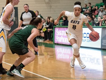 University of Brandon Bobcats guard Keisha Cox moves the ball against the University of Saskatchewan Huskies in CIS Women's Basketball action at the PAC in Saskatoon, November 19, 2016.