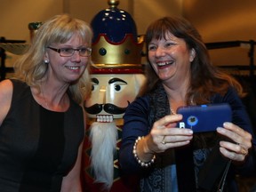 Krista Baerg and Julie Fehr get a selfie as they attend the Boxes & Bows Spirit of Christmas Gala in support of the Children's Hospital Foundation of Saskatchewan at TCU Place on Nov. 23.