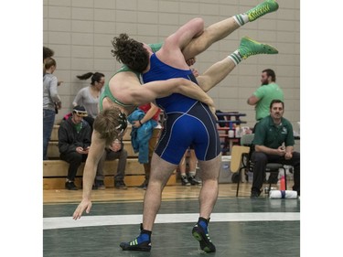 University of Saskatchewan Huskies wrestler Noah Bertholet takes on University of Calgary Dinos wrestler Bo Jackson during the Huskies Open wrestling at the Education Building on the U of S campus in Saskatoon, November 26, 2016.