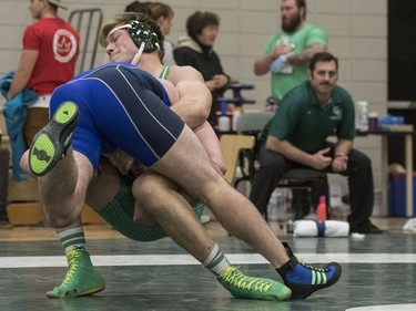 University of Saskatchewan Huskies wrestler Noah Bertholet takes on University of Calgary Dinos wrestler Bo Jackson during the Huskies Open wrestling at the Education Building on the U of S campus in Saskatoon, November 26, 2016.