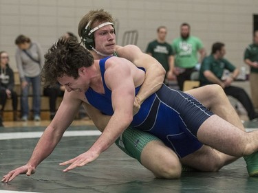 University of Saskatchewan Huskies wrestler Noah Bertholet takes on University of Calgary Dinos wrestler Bo Jackson during the Huskies Open wrestling at the Education Building on the U of S campus in Saskatoon, November 26, 2016.