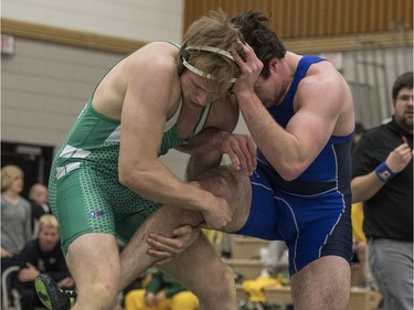 University of Saskatchewan Huskies wrestler Noah Bertholet takes on University of Calgary Dinos wrestler Bo Jackson during the Huskies Open wrestling at the Education Building on the U of S campus in Saskatoon, November 26, 2016.