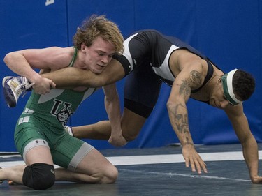 University of Saskatchewan Huskies wrestler Josh Bodnarchuk takes on STMC wrestler Jason Reeves during the Huskies Open wrestling at the Education Building on the U of S campus in Saskatoon, November 26, 2016.