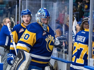 Saskatoon Blades goalie Brock Hamm leaves the ice after he and his team are defeated by the Medicine Hat Tigers in WHL action in Saskatoon, November 26, 2016.