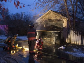 Firefighters responded to a garage fire on the 2100 block of 20th Street West, Tuesday, November 29, 2016.  (GREG PENDER/STAR PHOENIX)