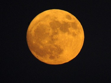 The moon rises over the San Gabriel Valley, as seen from Rosemead, California, November 13, 2016. Monday morning's supermoon will be the closet a full moon has been to the Earth since January 26, 1948.