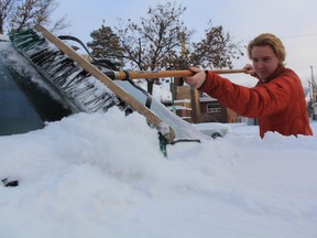 Friday's snowfall was snow problem for Chase Seale as he cleared off his vehicle on Broadway Avenue on Friday morning. Environment Canada said an Alberta Clipper storm system resulted in 10 to 15 centimetres of snow falling on Saskatoon, a snowfall the city called the "first snow event of the winter season."