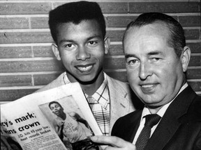 Harry Jerome, a North Vancouver high school student, set the new record at the 48th annual Vancouver inter-high school track meet at Empire Stadium on Wednesday May 28, 1959. prv070996olympic6 COPY FROM PRINT Photo dated May 30/1959, of sprinter Harry Jerome (left) meeting Percy Williams who complimented the young North Vancouver athlete for beating his 31 year old record for the 220 yard dash, by one tenth of a second. Jerome's time was 22.9 secs, while Williams was 22 flat, set in 1928. Province file photo. [PNG Merlin Archive] [PNG Merlin Archive]