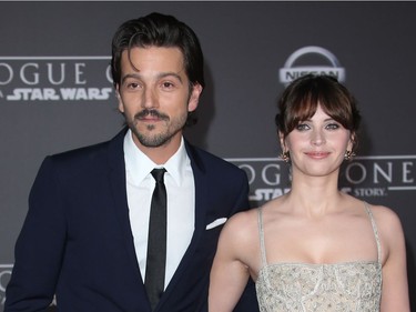 Diego Luna and Felicity Jones attend the Premiere of Walt Disney Pictures and Lucasfilm's "Rogue One: A Star Wars Story" in Hollywood, California, December 11, 2016.