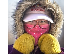 Howling winds with cold temperatures kept university students bundled up and scurrying to class, December 13, 2016.