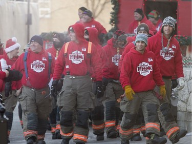 The Carolling Firefighters made their rounds through the downtown area of Saskatoon as they do every year — spreading Christmas cheer, singing carols and collecting spare change, with the money going to Secret Santa, December 16, 2016.