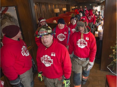 The Carolling Firefighters made their rounds through the downtown area of Saskatoon as they do every year — spreading Christmas cheer, singing carols and collecting spare change, with the money going to Secret Santa, December 16, 2016.