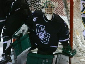 University of Saskatchewan Huskies goalie Jordon Cooke in action against the University of Alberta Golden Bears in Saskatoon on December 2, 2016.