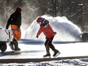 A skater couldn't wait for the rink attendants to finish with the snow blowing and flooding on on Boxing Day.