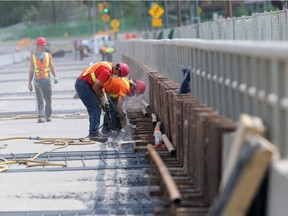 Work continues on the deck of the University Bridge on May 25, 2015 in Saskatoon.