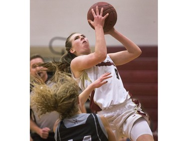 Centennial Chargers' Kaitlyn Jockins with the lay up in second quarter play against St. Joseph Guardians in Saskatoon High School Basketball league play, November 29, 2016.