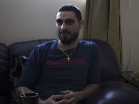 Shadi Adam Mikhael who has been in Canada since January 8th, 2016 sits in his home in Saskatoon, Saskatchewan on Friday, December 30th, 2016. (Kayle Neis/Saskatoon StarPhoenix)