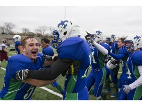 Bishop Mahoney celebrates its 3A football city title last fall.