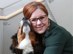 Erin Wasson, the only veterinarian social worker in Canada, shown with Soup at the U of S vet college.