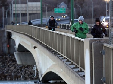 Commuters jog, bike and walk across the Senator Sid Buckwold Bridge Tuesday morning in Saskatoon, December 20, 2016.