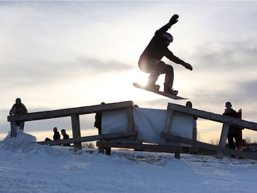 Olympic medalist Mark McMorris snowboards during a ride along at Diefenbaker Park in Saskatoon on December 21, 2016.