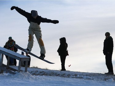 Snowboarders take to the hill during a ride along and meet and greet with Olympic medalist Mark McMorris and his brother Craig McMorris, member of the Canadian national snowboarding team in slopestyle at Diefenbaker Park in Saskatoon on December 21, 2016.