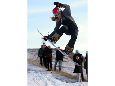 Snowboarders take to the hill during a ride along and meet and greet with Olympic medalist Mark McMorris and his brother Craig McMorris, member of the Canadian national snowboarding team in slopestyle at Diefenbaker Park in Saskatoon on December 21, 2016.