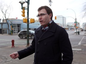 Councillor Zach Jeffries speaks about the rapid rectangular flashing beacons (RRFB) which can enhance safety by reducing crashes between vehicles and pedestrians at unsignalized intersections. A pilot project has been agreed upon by city council once funding is found in Saskatoon on December 22, 2016. (Michelle Berg / Saskatoon StarPhoenix)