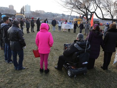 A group of 35 people walked from Midtown Plaza to the bottom of the Broadway Bridge during a Standing Rock solidarity protest in Saskatoon on December 4, 2016.