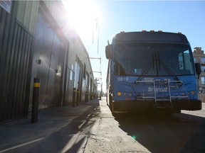 A city bus is parked outside the bus barn on October 19, 2014 in Saskatoon. (Michelle Berg / The StarPhoenix)