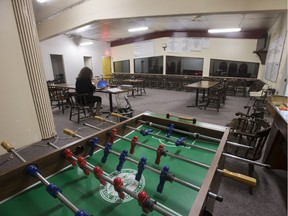 A foosball table is moved to make room for court in Blaine Lake, Sask., which is held in the upstairs lounge of the community's curling rink.