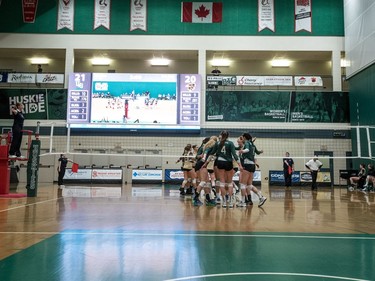 The University of Saskatchewan Huskies women's volleyball team celebrates against the University of Manitoba Bisons during CIS Women's volleyball action in Saskatoon, December 3, 2016.