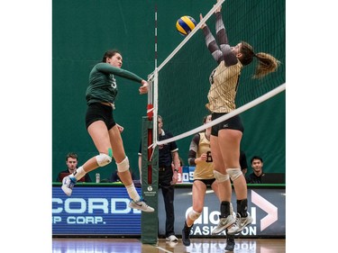 University of Saskatchewan Huskies women's volleyball middle blocker #3 Marguerite Ferguson hits the ball against the University of Manitoba Bisons during CIS Women's Volleyball action in Saskatoon, December 3, 2016.