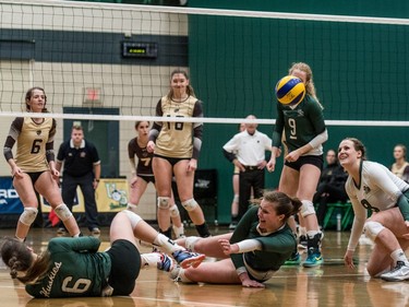 University of Saskatchewan Huskies women's volleyball middle blocker #4 Taylor Annala misses the ball against the University of Manitoba Bisons during CIS Women's Volleyball action in Saskatoon, December 3, 2016.