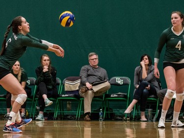 University of Saskatchewan Huskies women's volleyball middle blocker #6 Emmalyn Copping hits the ball against the University of Manitoba Bisons during CIS Women's Volleyball action in Saskatoon, December 3, 2016.